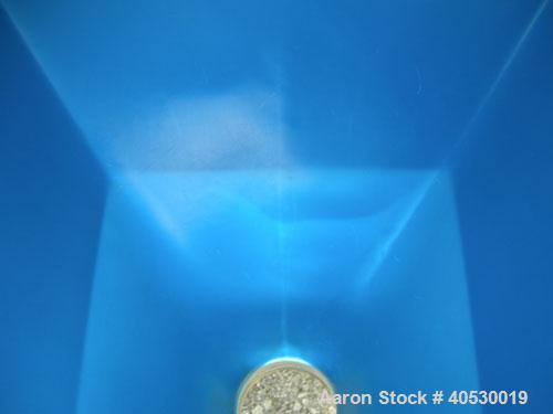 Used Plastic Tote Bin, approximately 10 cubic feet (75 gallon). 49" wide x 43" long x 8" straight side x 36" cone bottom. 20" top opening, 8" center bottom outlet. Mounted in carbon steel stackable f...