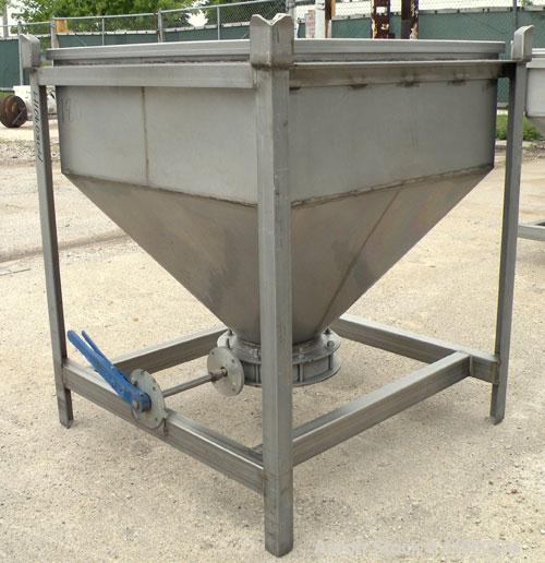 Used Dry Tote Bin, approximately 14 cubic feet capacity, 304 stainless steel. 36" x 36" x 14" straight side x 24" coned bottom. Open top with a 1 piece cover, 10" center bottom outlet with a manually...