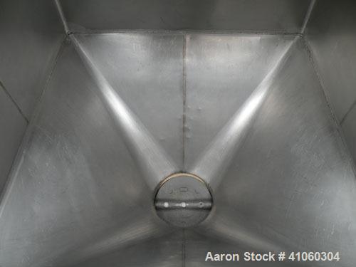 Used Dry Tote Bin, approximately 14 cubic feet capacity, 304 stainless steel. 36" x 36" x 14" straight side x 24" coned bottom. Open top with a 1 piece cover, 10" center bottom outlet with a manually...