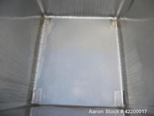 Used Custom Powder Systems Open Top Rolled Lip Bin, 49.4 cubic feet, 304L stainless steel. 42’’ wide x 48’’ long x 48’’ deep. Mounted on stainless steel legs.