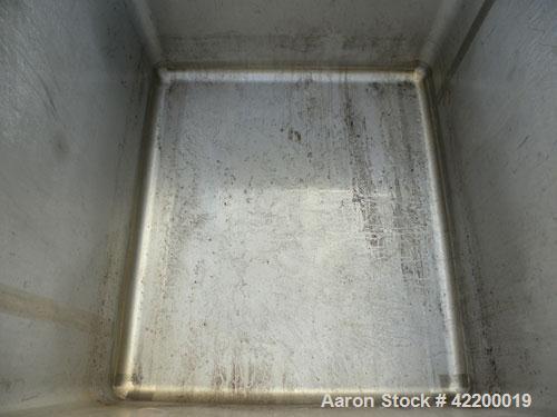 Used Custom Powder Systems Open Top Rolled Lip Bin, 49.4 cubic feet, 304L stainless steel. 42’’ wide x 48’’ long x 48’’ deep. Mounted on stainless steel legs.
