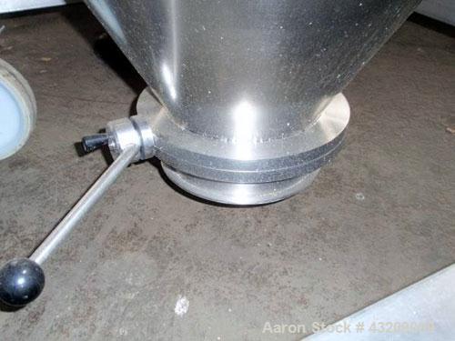 Used Tote Bin, approximately 350 liters (12.3 cubic feet), stainless steel. Approximately 48" diameter x 36’' deep cone with 9" diameter bottom discharge with valve. 24" and 12" top ports with covers...