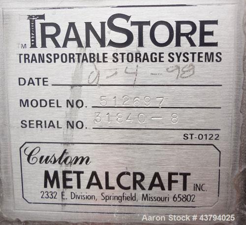 Used Custom Metalcraft TransStore Transportable Powder Tote, Approximate 60 Cubic Feet (448 gallon), Model 512697, 316L Stainless Steel. 48” Long x 42’ wide x 44” straight side x coned bottom, flat t...