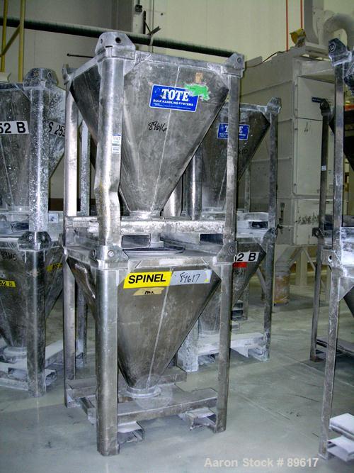 USED: Tote Systems powder tote bin, approximate 10 cubic feet, aluminum. 36" wide x 36" long x 2" straight side x 39" coned bottom. 22" diameter top opening, 8" center bottom outlet. Mounted on forkl...