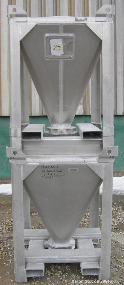 USED: Tote Systems powder tote bin, approximate 10 cubic feet, aluminum. 36" wide x 36" long x 2" straight side x 39" coned bottom. 22" diameter top opening, 8" center bottom outlet. Mounted on forkl...