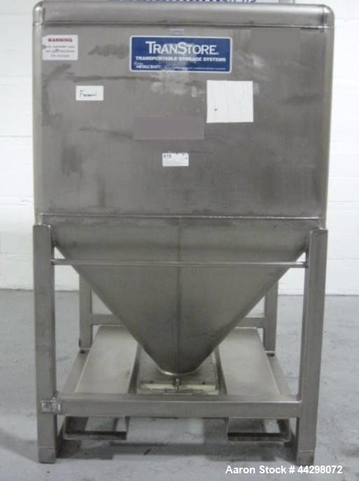 Used Transtore Tote Bin, 60 cubic feet, stainless steel construction, approximately 48" x 48" x 36" straight side x 36" cone bottom.