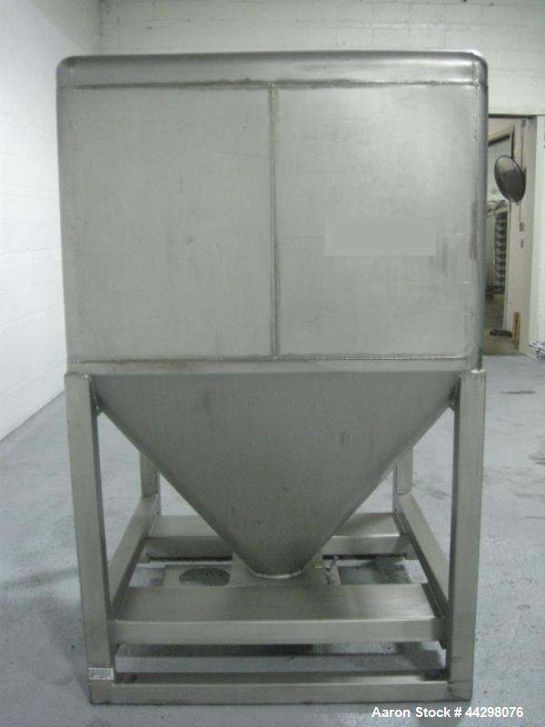Used- Transtore Tote Bin, 60 cubic feet, stainless steel construction, approximately 48" x 48" x 36" straight side x 36" con...