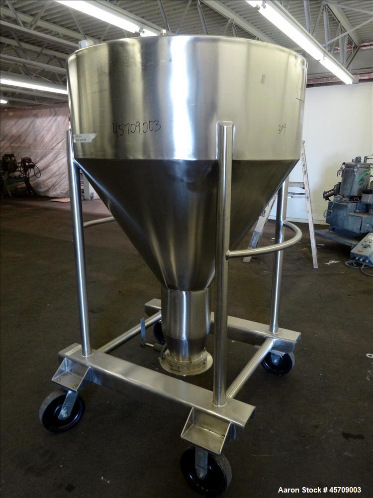 Used United Utensils Powder Tote Bin, Approximate 20 Cubic Feet, 304 Stainless Steel. Approximately 48" diameter x 17" straight side and 34" coned bottom. Flat top includes 20" opening with a plastic...