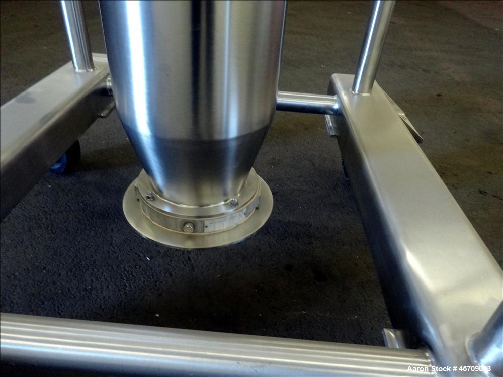 Used United Utensils Powder Tote Bin, Approximate 20 Cubic Feet, 304 Stainless Steel. Approximately 48" diameter x 17" straight side and 34" coned bottom. Flat top includes 20" opening with a plastic...