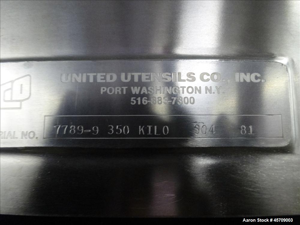 Used United Utensils Powder Tote Bin, Approximate 20 Cubic Feet, 304 Stainless Steel. Approximately 48" diameter x 17" straight side and 34" coned bottom. Flat top includes 20" opening with a plastic...