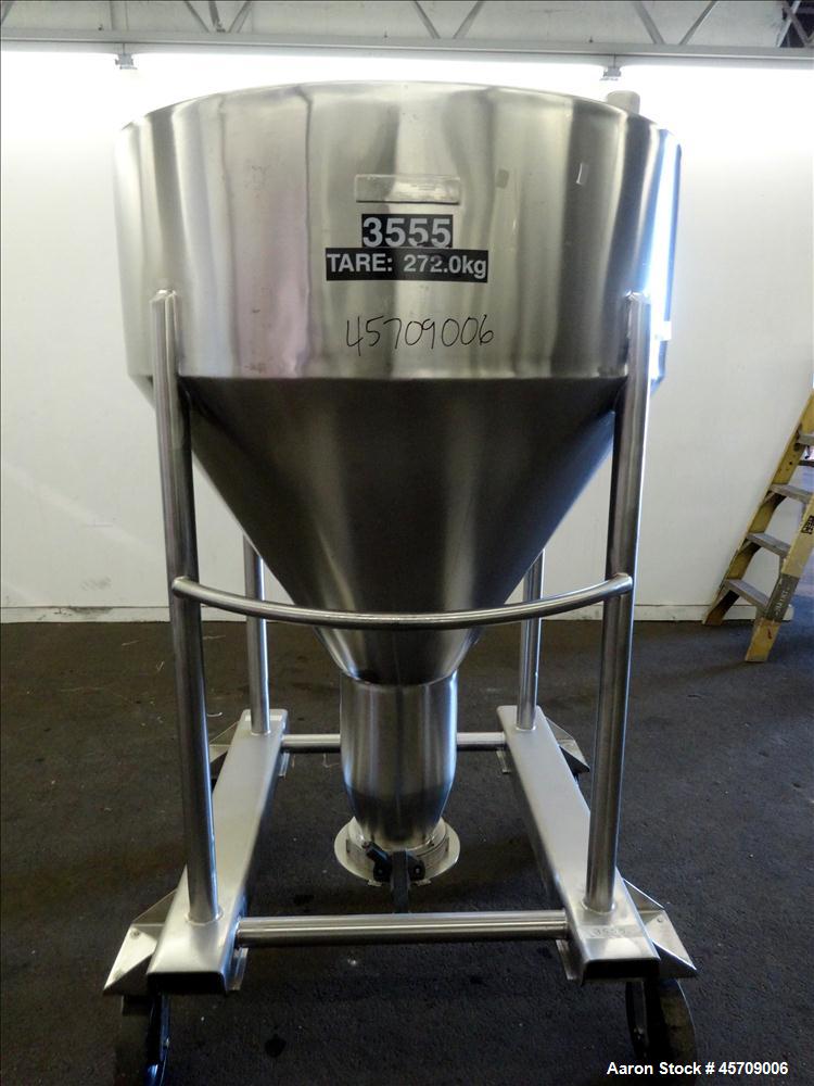 Used United Utensils Powder Tote Bin, Approximate 20 Cubic Feet, 304 Stainless Steel. Approximately 48" diameter x 17" straight side and 34" coned bottom. Flat top includes 20" opening with a plastic...