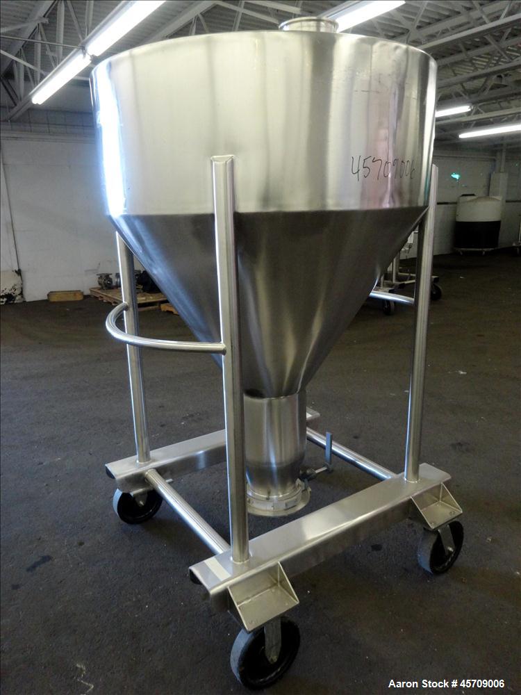 Used United Utensils Powder Tote Bin, Approximate 20 Cubic Feet, 304 Stainless Steel. Approximately 48" diameter x 17" straight side and 34" coned bottom. Flat top includes 20" opening with a plastic...