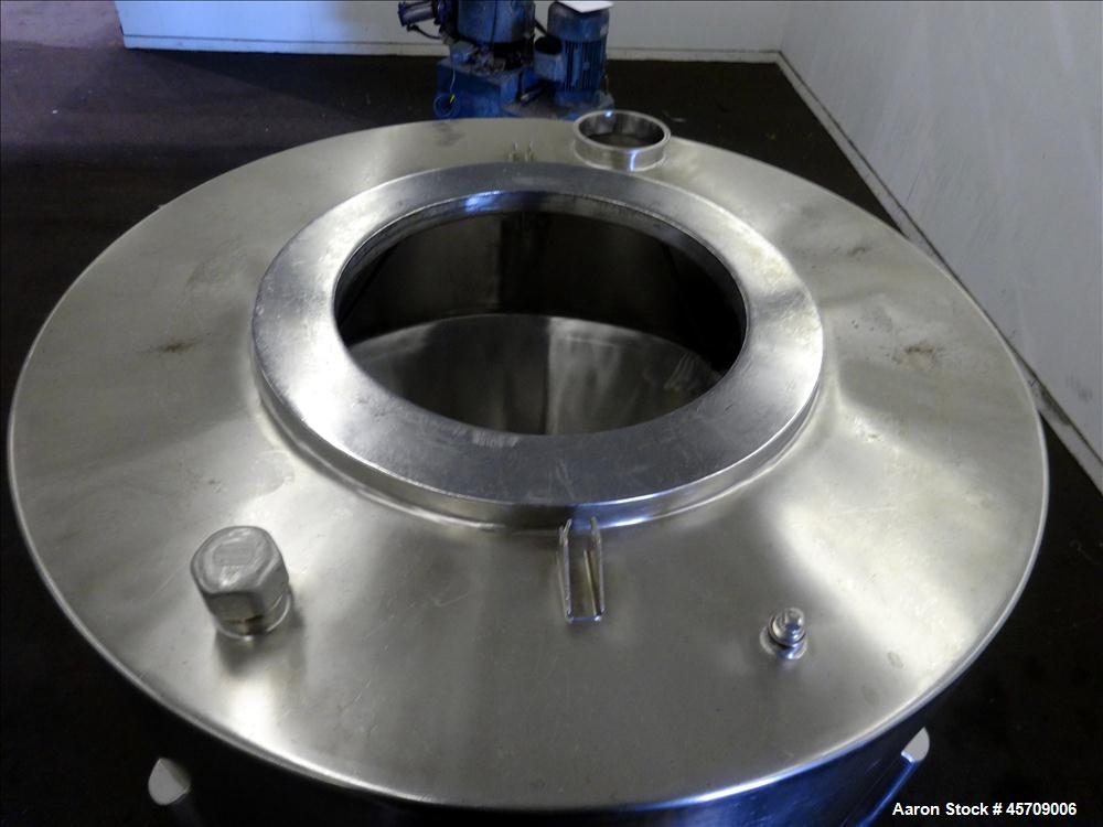 Used United Utensils Powder Tote Bin, Approximate 20 Cubic Feet, 304 Stainless Steel. Approximately 48" diameter x 17" straight side and 34" coned bottom. Flat top includes 20" opening with a plastic...