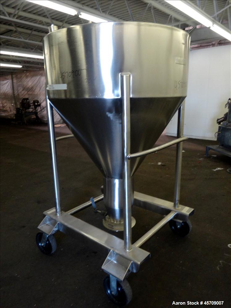 Used United Utensils Powder Tote Bin, Approximate 20 Cubic Feet, 304 Stainless Steel. Approximately 48" diameter x 17" straight side and 34" coned bottom. Flat top includes 20" opening with a plastic...