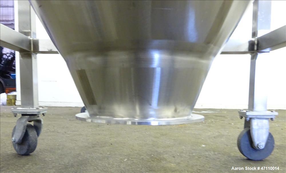 Used United Utensils Hopper Tote, Approximate 17 Cubic Feet, 304 Stainless Steel. Approximate 52" diameter x 45" deep coned hopper. Top cover with a 22-1/2" inlet, 8" center bottom outlet with a manu...