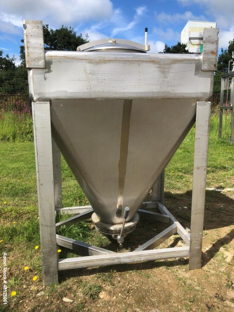 Used Approximately 600 litre (21.2 Cu.Ft.)stainless steel product containers. Unit measures approximately 1,050mm long x 805mm wide x 205mm straight side height with 1,000mm cone height. Has top manw...