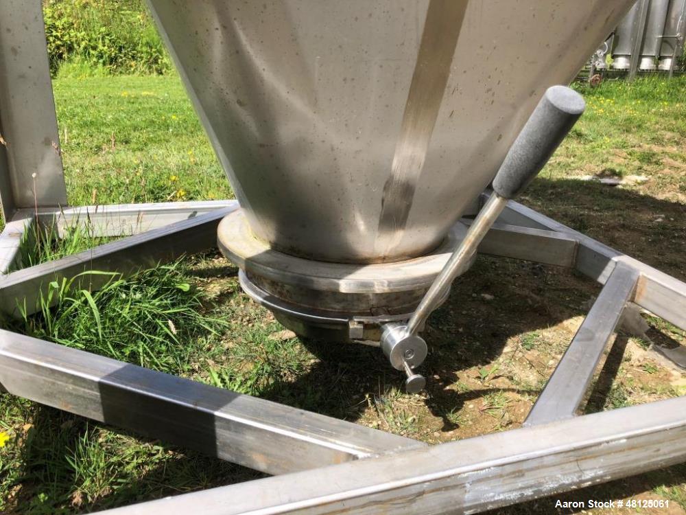 Used Approximately 600 litre (21.2 Cu.Ft.)stainless steel product containers. Unit measures approximately 1,050mm long x 805mm wide x 205mm straight side height with 1,000mm cone height. Has top manw...