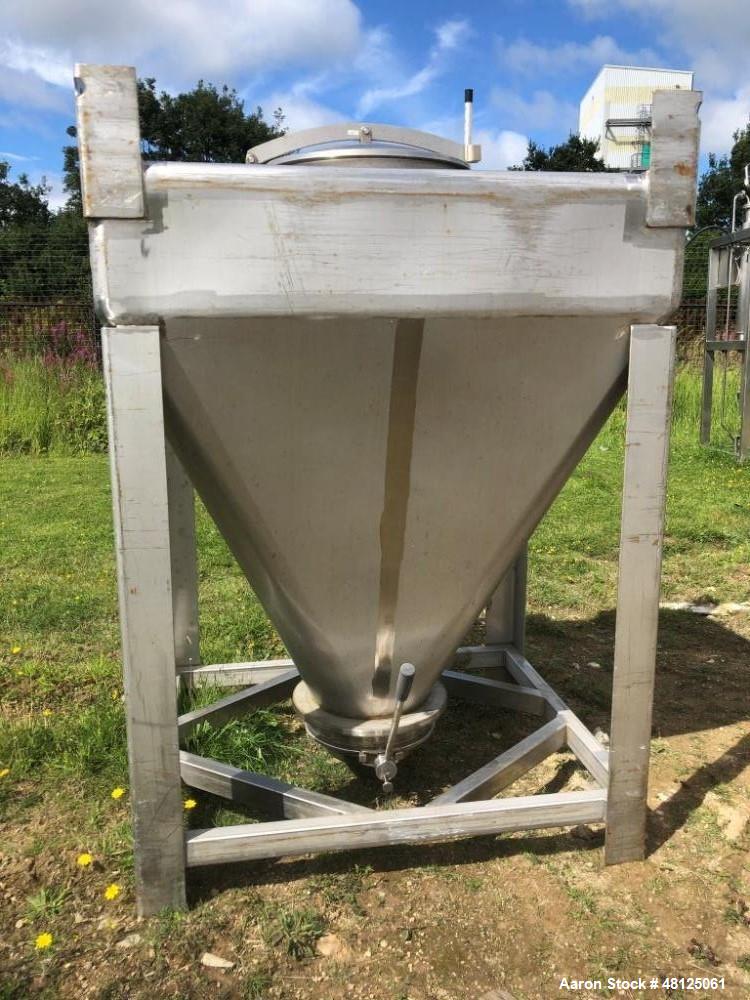 Used Approximately 600 litre (21.2 Cu.Ft.)stainless steel product containers. Unit measures approximately 1,050mm long x 805mm wide x 205mm straight side height with 1,000mm cone height. Has top manw...