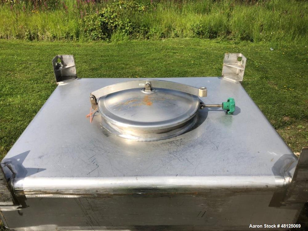Used Approximately 600 litre (21.2 Cu.Ft.)stainless steel product containers. Unit measures approximately 1,050mm long x 805mm wide x 205mm straight side height with 1,000mm cone height. Has top manw...