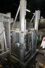 Used FPEC High Lift Gaylord Box Dumper, Model HLD 725, Stainless Steel. Has a capacity of 3,000 lbs, platform size of 48