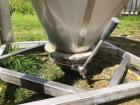 Used Approximately 600 litre (21.2 Cu.Ft.)stainless steel product containers. Unit measures approximately 1,050mm long x 805mm wide x 205mm straight side height with 1,000mm cone height. Has top manw...