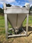 Used Approximately 600 litre (21.2 Cu.Ft.)stainless steel product containers. Unit measures approximately 1,050mm long x 805mm wide x 205mm straight side height with 1,000mm cone height. Has top manw...