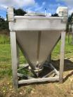 Used Approximately 600 litre (21.2 Cu.Ft.)stainless steel product containers. Unit measures approximately 1,050mm long x 805mm wide x 205mm straight side height with 1,000mm cone height. Has top manw...