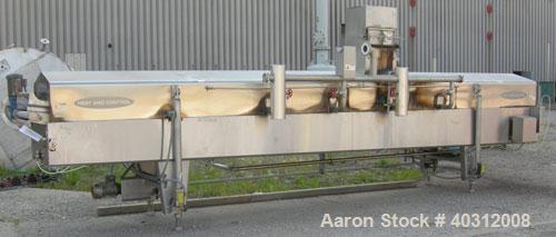 Used Heat and Control Heat Wave Fryer, Model HWF. 28" wide x 12' long, 304 stainless steel wire mesh belt, driven by a 1 hp, 3/60/208-230/460 volt, 1725 rpm gearmotor. Approximate fry time 7-28 secon...
