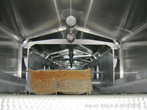 Used Heat and Control Heat Wave Fryer, Model HWF. 28" wide x 12' long, 304 stainless steel wire mesh belt, driven by a 1 hp, 3/60/208-230/460 volt, 1725 rpm gearmotor. Approximate fry time 7-28 secon...