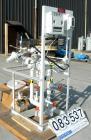 USED: Stokes heating skid, model 600-540. Designed for water heating for a conical or shelf dryer. Consists of (1) heat exchanger, shell and tubes rted for 125 psi at 400 deg F; (1) 3/4 hp XP pump, m...
