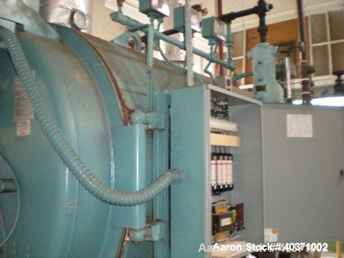 Used Cleaver Brooks boiler, model CB700-60. 60 hp, 150 psi design pressure. Natural gas fired. Includes feedwater tank, pump and blow down tank. Mfg 1995.