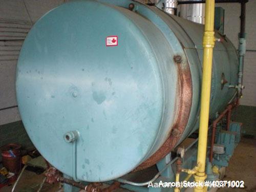 Used Cleaver Brooks boiler, model CB700-60. 60 hp, 150 psi design pressure. Natural gas fired. Includes feedwater tank, pump and blow down tank. Mfg 1995.
