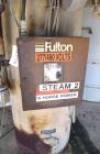 Used Fulton Fuel Fired Steam Boiler, Model FB-015-A. Boiler hp 15, 150 psi, rated 518 pound per hour, Includes control panel, and a boiler return system with pump. National Board# 78698, built 1997.