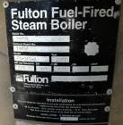 Used Fulton Fuel Fired Steam Boiler, Model FB-015-A. Boiler hp 15, 150 psi, rated 518 pound per hour, Includes control panel, and a boiler return system with pump. National Board# 78698, built 1997.