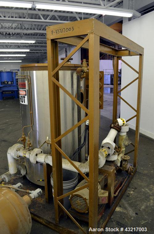 Used Fulton Electric Thermal Fluid Heater, Model FT-0150-N. 144000000 BTU/HR. 44 KW, 150 psi working pressure. 3 Phases, 460 volts. Skid mounted with deaerator tank, control panel, and pump. Includes...