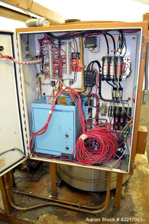 Used Fulton Electric Thermal Fluid Heater, Model FT-0150-N. 144000000 BTU/HR. 44 KW, 150 psi working pressure. 3 Phases, 460 volts. Skid mounted with deaerator tank, control panel, and pump. Includes...