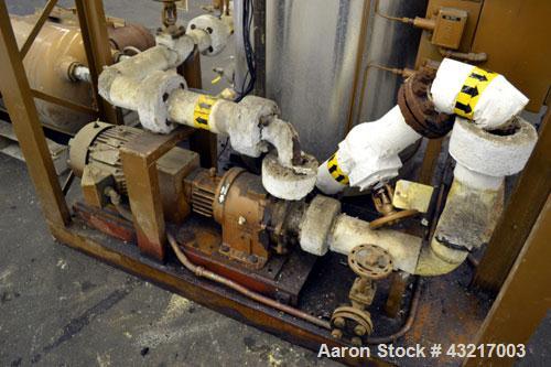 Used Fulton Electric Thermal Fluid Heater, Model FT-0150-N. 144000000 BTU/HR. 44 KW, 150 psi working pressure. 3 Phases, 460 volts. Skid mounted with deaerator tank, control panel, and pump. Includes...