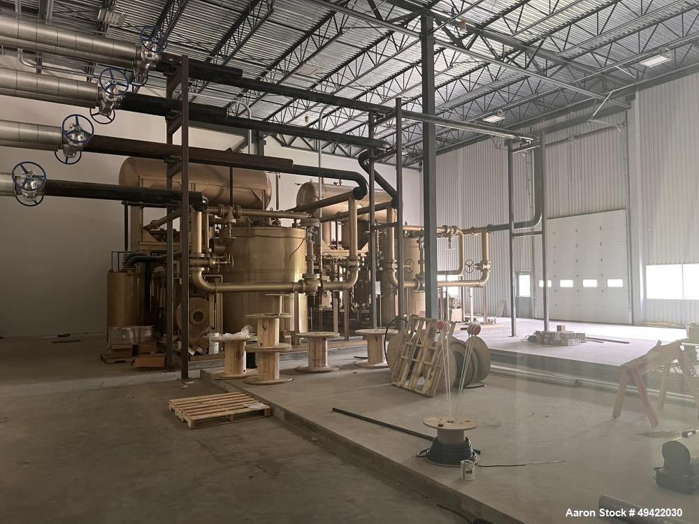 Unused - Fulton Model FT-1000CU LE Boiler. Single system flow rate of 800 GPM, hour meter burners, alarm horn, 1.5" 300 lbs, knuckle safety relief valve set, 450 deg F. firing rate mod inlet. Parathe...