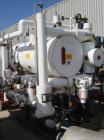 USED: Syltherm skid consisting of (1) ITT shell and tube heat exchanger, shell and tubes rated 150 psi at 375 deg F; (1) Goulds centrifugal pump, model 3296, 316 stainless steel, rated 135 gallons pe...
