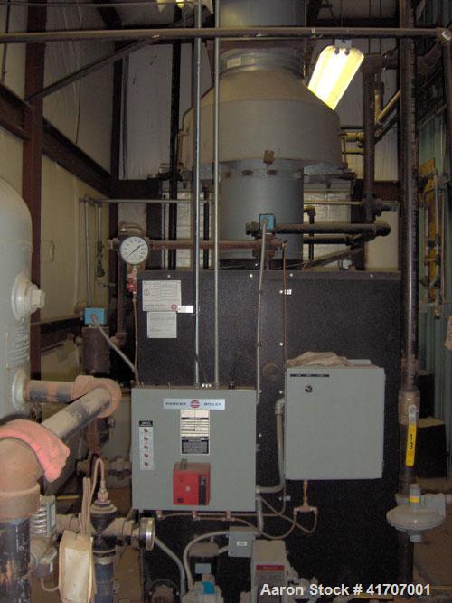 Used Parker Water Tube Boiler, Model 104-50. Natural gas, 50 hp, 1725 pounds/hour, 200 psi. Includes blowdown tank, pressure tank and all related equipment. Mfg 2000. Less than 1000 hours.