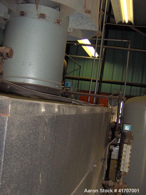 Used Parker Water Tube Boiler, Model 104-50. Natural gas, 50 hp, 1725 pounds/hour, 200 psi. Includes blowdown tank, pressure tank and all related equipment. Mfg 2000. Less than 1000 hours.