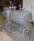 Used Cemline Horizontal Unfired Steam Generator, Model H120USG1048. Size 24 x 63. 120 gallon capacity. Rated 150 psi water and steam. Coil model 1048ASP. Base mounted.