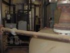 Used Parker Water Tube Boiler, Model 104-50. Natural gas, 50 hp, 1725 pounds/hour, 200 psi. Includes blowdown tank, pressure tank and all related equipment. Mfg 2000. Less than 1000 hours.