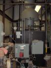 Used Parker Water Tube Boiler, Model 104-50. Natural gas, 50 hp, 1725 pounds/hour, 200 psi. Includes blowdown tank, pressure tank and all related equipment. Mfg 2000. Less than 1000 hours.