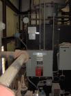 Used Parker Water Tube Boiler, Model 104-50. Natural gas, 50 hp, 1725 pounds/hour, 200 psi. Includes blowdown tank, pressure tank and all related equipment. Mfg 2000. Less than 1000 hours.