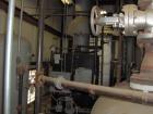 Used Parker Water Tube Boiler, Model 104-50. Natural gas, 50 hp, 1725 pounds/hour, 200 psi. Includes blowdown tank, pressure tank and all related equipment. Mfg 2000. Less than 1000 hours.
