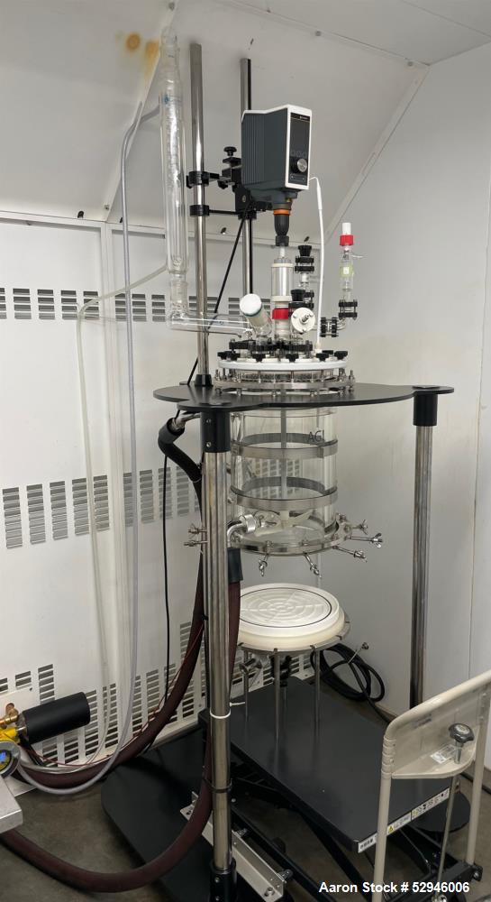 Used AG! Glassplant 20L Pilot Plant Nutsche Filter. 20 Liter Capacity. Filtration area 514.7 cm2. Glass vessel. Top entering overhead stirrer. Mounted on frame with casters.