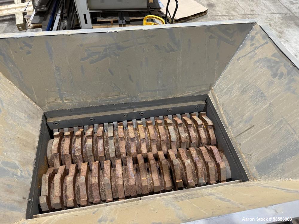 Used Twin Shaft Shredder. Feed throat approximate 22-1/4" x 39-1/4". Knife diameter approximate 10", approximate 1-1/4" thick. Driven by (2) 18.5kW, 3/60/240 Volt, 1760 rpm motor thru reducer, 71 to ...