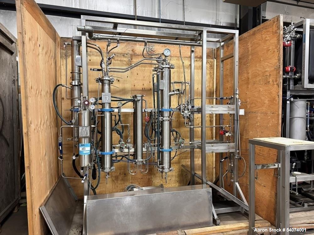 Used Vitalis R-Series CO2 Extraction System. Consisting of: Model R200H Extractor Assembly; Accumulator/Pump & Refrigeration Assembly; Hydraulic Power Unit; Control Panels; Navien Tankless Water Heat...