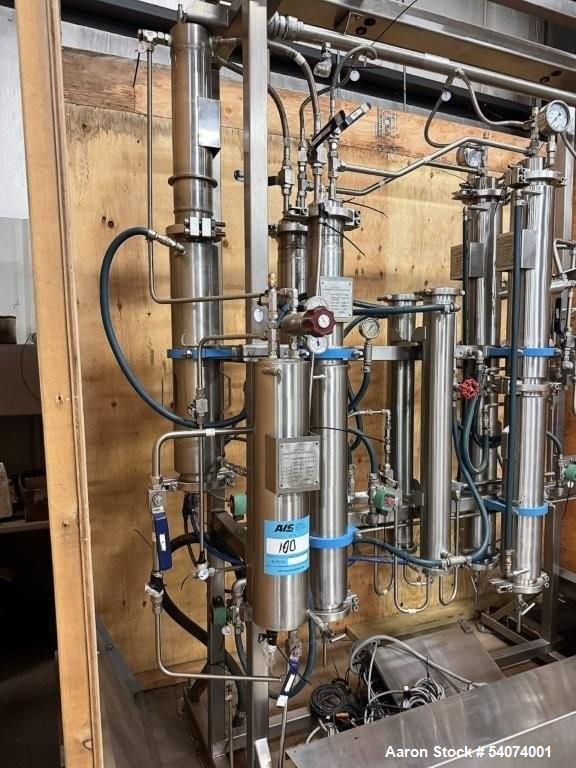 Used Vitalis R-Series CO2 Extraction System. Consisting of: Model R200H Extractor Assembly; Accumulator/Pump & Refrigeration Assembly; Hydraulic Power Unit; Control Panels; Navien Tankless Water Heat...